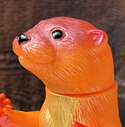 Ollie Otter mini sized Bright Orange soft vinyl